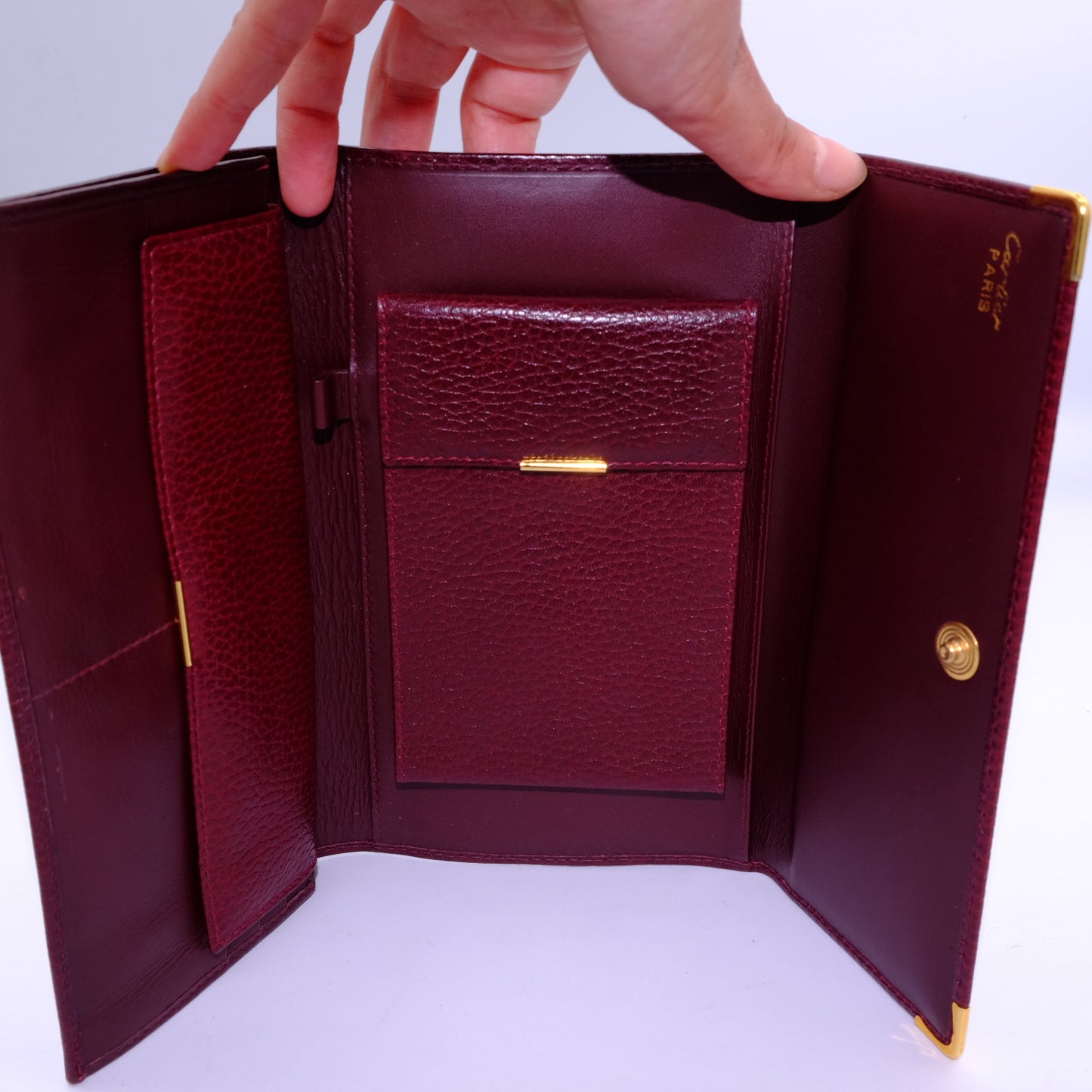 Portafoglio Cartier Must de Cartier in Pelle Bordeaux